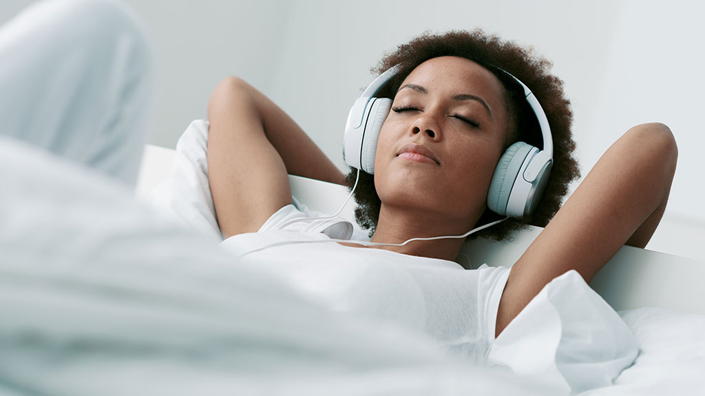 woman sleeping with headphones 1024x575 1